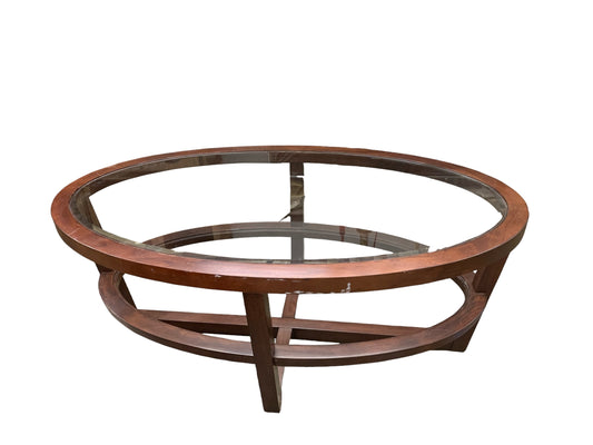 Oval glass-top coffee table on dark wood frame, 48x28x20"