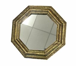 Octagonal mirror in goldtone metal frame, 18" diam.