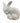 White seated rabbit, 8.5" h, 8.25" w, 6" d