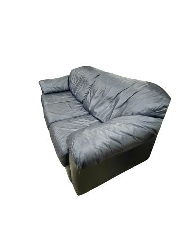 Modern navy blue leather sofa, 32H. 82W. 36D.