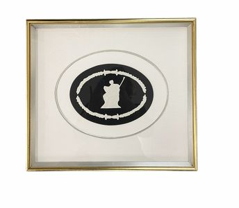 PAIR of oval cameo reliefs on black ground in shadow box gold frames