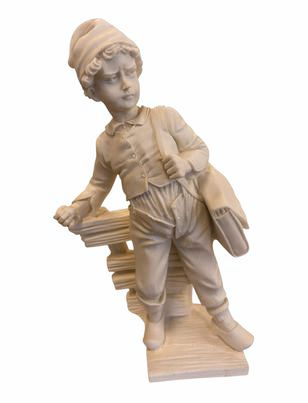 Figurine of a boy mail carrier throwing snowball, 9" h