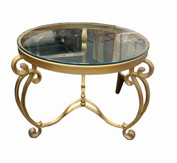 Round glass-top table on goldtone iron base, 28" diam., 24.5" h