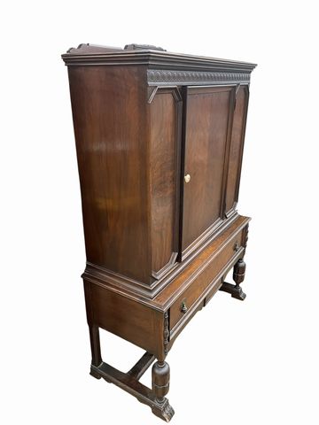 Antique Jacobean Revival-style china cabinet, 65H. 42.5W. 18D