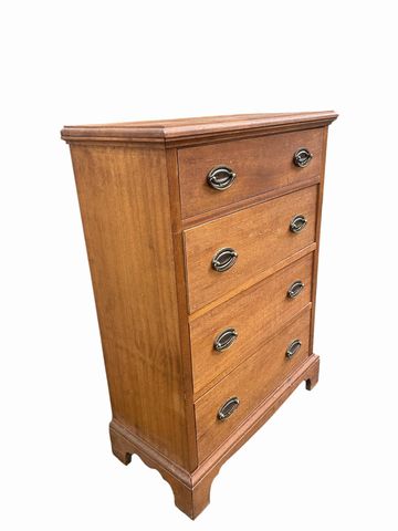 Vintage 4-drawer lt. brown wooden chest of drawers, 34.75H.25.5W. 12.25D.