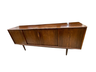 MCM rosewood sideboard w/sliding doors, 32.5H. 79W. 18.25D.