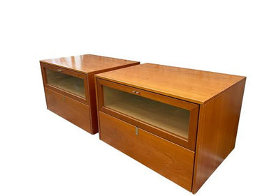 Pair of maple nightstands w/2 drawers, one w/glass front, 17.75H. 25W. 18.25D.