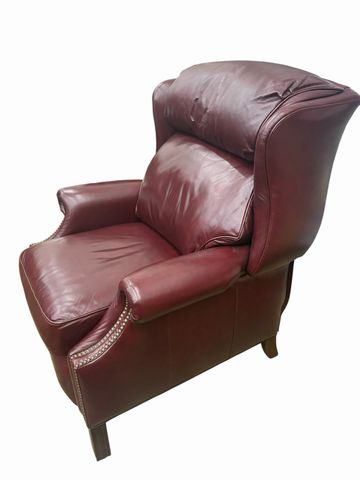 Faux cordovan leather recliner w/ nailhead trim, 30.25" h, 22.5" w, 14.5" d