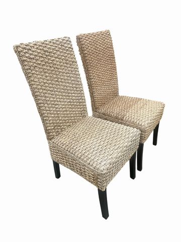 Pair of rattan parson-style armless side chairs, 41H. 18W. 22D.