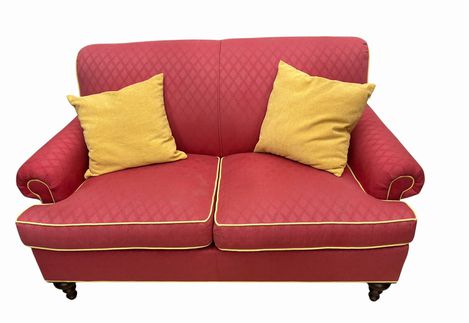 Raspberry loveseat w/ yellow welting and 2 pillows, 60" w x 36" d x 35" h