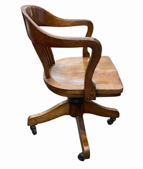 Banker's-style wooden swivel desk chair, 32.5H 22.5W 20D
