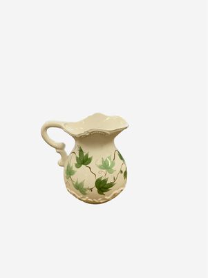 White ceramic pitcher w/ green leaves, 7.25"H