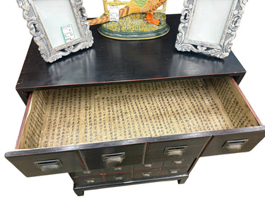 Black/red apothecary-style chest of drawers, 47.25" h, 31.5" w, 17" d