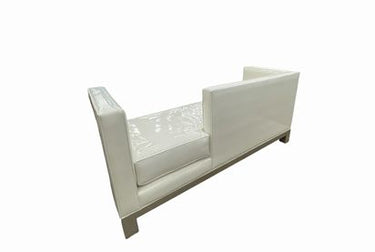 J.A. Casillas MCM-style white vinyl upholstered sofa on metal frame, 30H.67W.25D