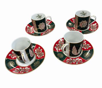 Set of 4 Neiman Marcus holiday demitasse cups/saucers (4.75" diam.)