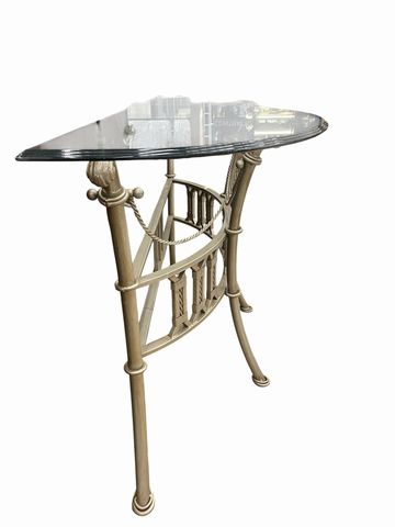 Hollywood Regency-style demilune table w/glass top, 30.25H. 55.5W. 21D.
