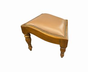Inclined faux leather ottoman w/ nailhead trim, 12.5" h, 20" w, 16.25" d