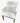 White striated upholstered armchair w/ white waffle pillow, 34.5" h x 22.5 w x 1