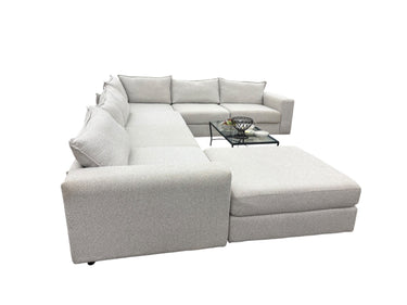 Large oatmeal-colored sectional w/ open-weave upholstery, 36" h, 243" w, 33.5" d