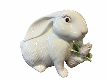White ceramic rabbit w/ basket of flowers, 6.5" h, 8.25" w, 5" d