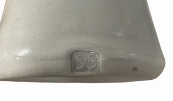 Wheel-thrown altered white glazed stoneware vase, 6" h, 4.5" diam.