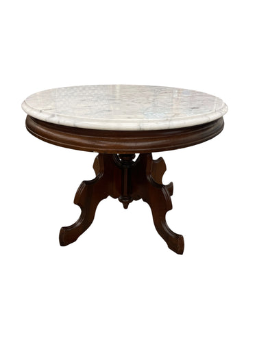 Victorian-style oval marble top coffee table, 19.5H. 34W. 25D.