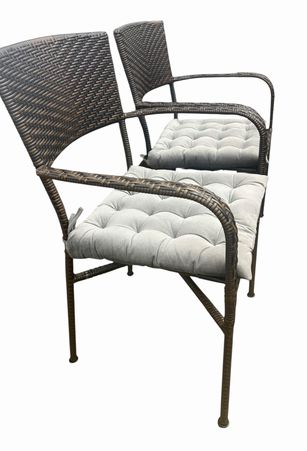 PAIR of brown outdoor wicker armchairs w/ gray tufted seat cushions, 35" h, 22"