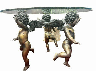 Antique European round beveled glass-top coffee table w/ 3 bronze putti supports